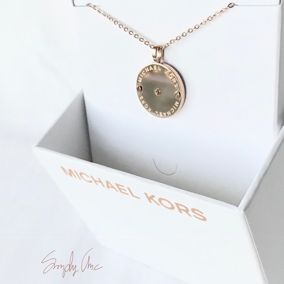 Michael Kors Jewelry - Restocked new MK rose Gold Tone logo disc pendant